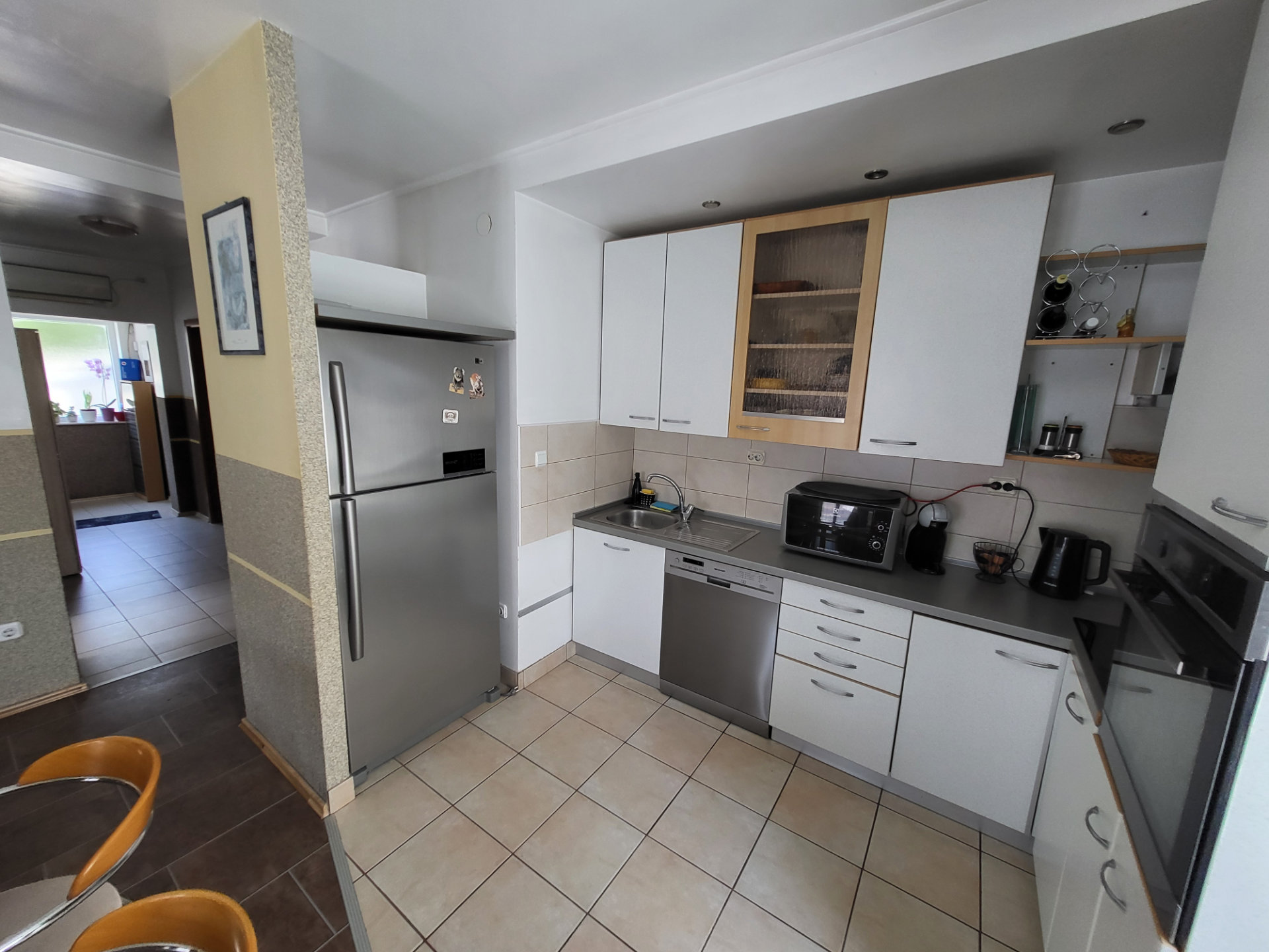 Spacious kitchen with appliances and plenty of counter space